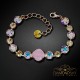 Aproce „Apžilbinošs Mirdzums II (Rose Water Opal / Aurora Borealis / Golden Shadow)“ ar Swarovski™ kristāliem